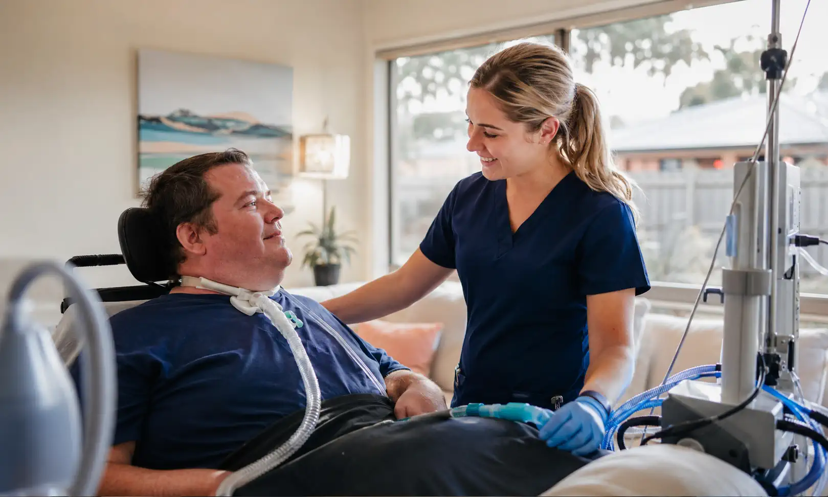 NDIS nurse providing Complex Nursing Care and High Intensity Supports to a participant at home in Melbourne.